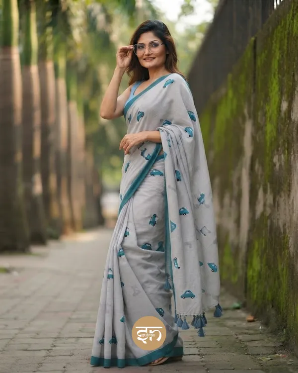 Raahi:_Grey_Pure_Mul_Cotton_Saree_with_All-Over_Taxi_Scooty_Printed__Work