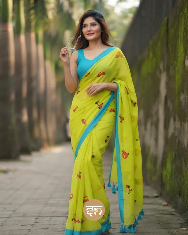 Raahi:_Lime_Green_Pure_Mul_Cotton_Saree_with_All-Over_Taxi_Scooty_Printed__Work