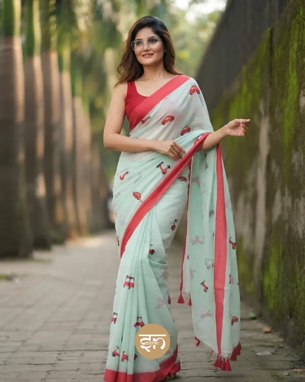 Raahi:_Mint_Green_Pure_Mul_Cotton_Saree_with_All-Over_Taxi_Scooty_Printed__Work