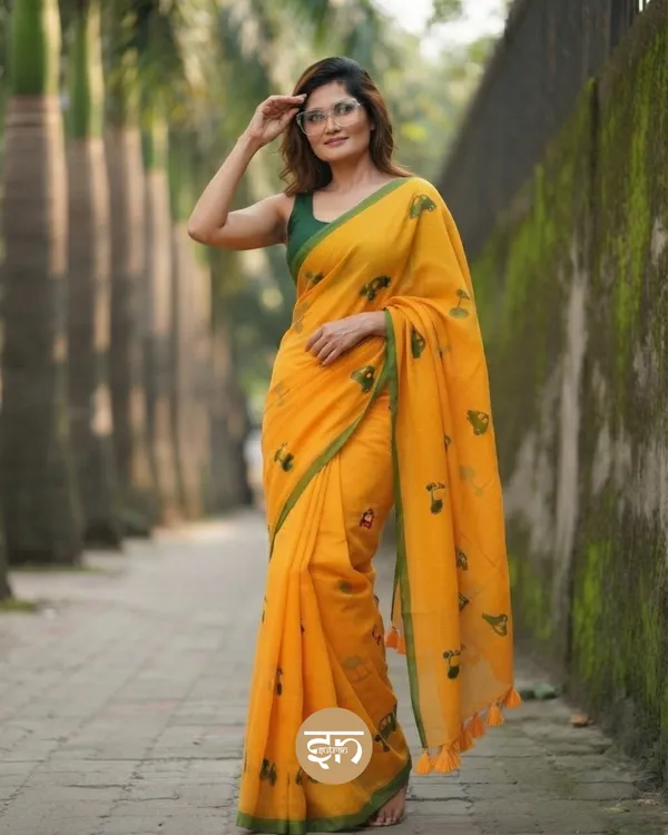 Raahi:_Mustard_Yellow_Pure_Mul_Cotton_Saree_with_All-Over_Taxi_Scooty_Printed__Work