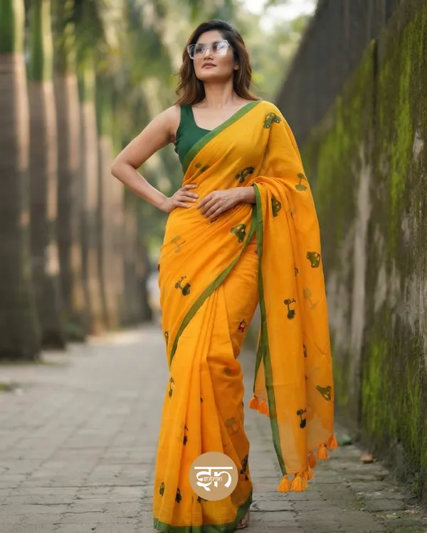 Raahi:_Mustard_Yellow_Pure_Mul_Cotton_Saree_with_All-Over_Taxi_Scooty_Printed__Work