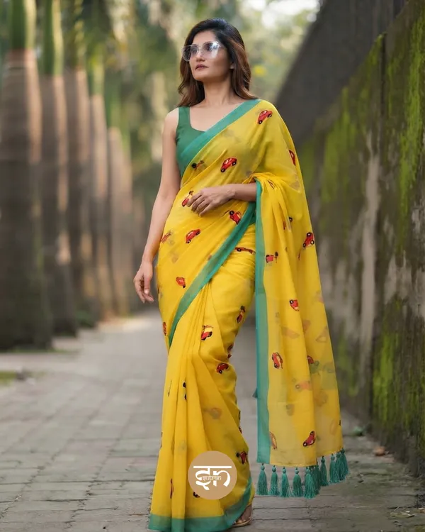 Raahi:_Yellow_Pure_Mul_Cotton_Saree_with_All-Over_Taxi_Scooty_Printed__Work