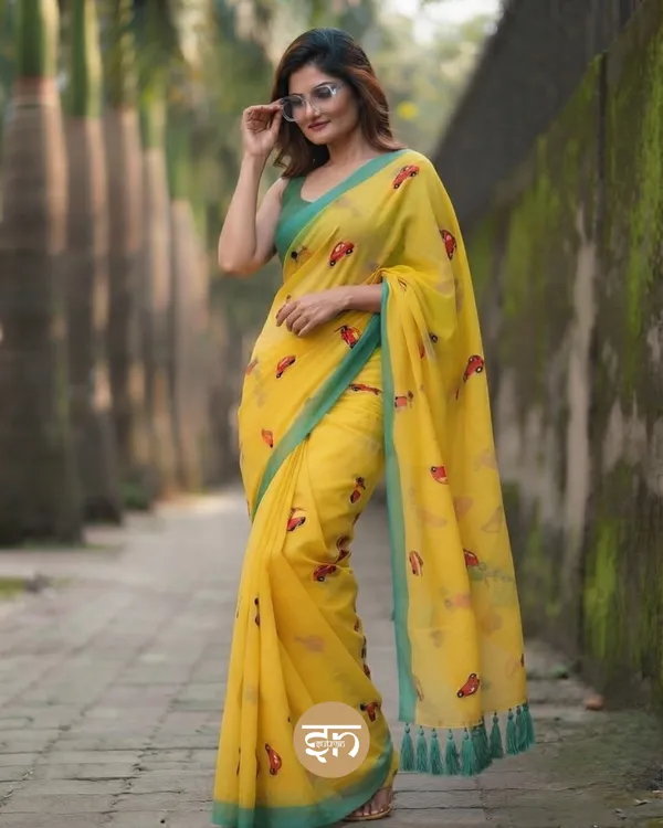 Raahi:_Yellow_Pure_Mul_Cotton_Saree_with_All-Over_Taxi_Scooty_Printed__Work