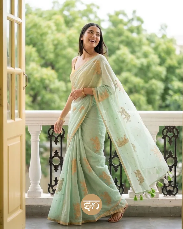 Swarna_Cheetah:_Mint_Green_Pure_Mul_Cotton_Saree_with_Delicate_Cheetah_Printed_Work
