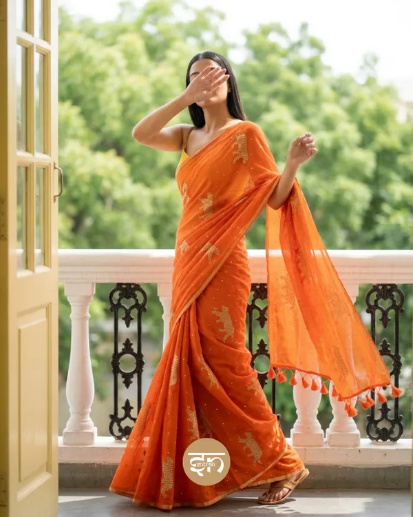 Swarna_Cheetah:_Orange_Pure_Mul_Cotton_Saree_with_Delicate_Cheetah_Printed_Work