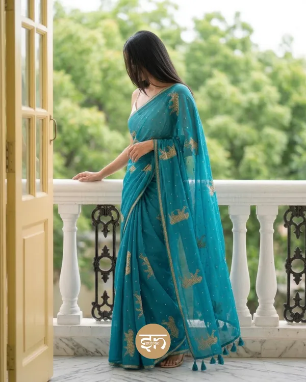 Swarna_Cheetah:_Turquoise_Pure_Mul_Cotton_Saree_with_Delicate_Cheetah_Printed_Work