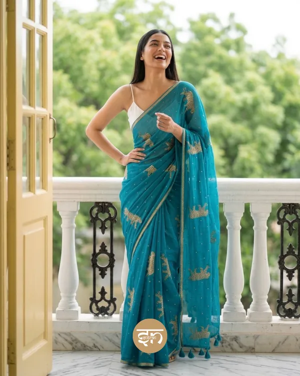 Swarna_Cheetah:_Turquoise_Pure_Mul_Cotton_Saree_with_Delicate_Cheetah_Printed_Work