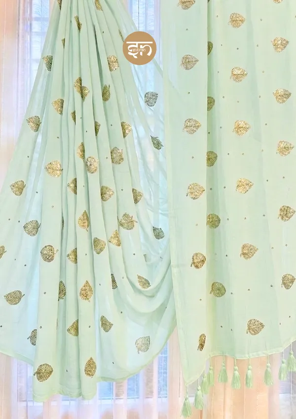 Moonlit_Leaves:_Mint_Green_Pure_Mul_Cotton_Saree_with_Elegant_Leaf_Sequin_Embroidery_Work