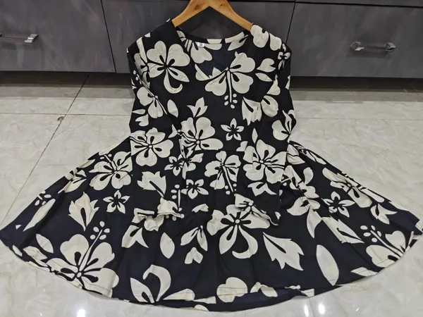 Black_Cotton_Floral_Print_Peplum_Top_For_Women