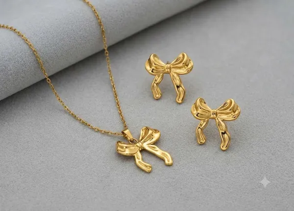 Gold_Steel_Ribbon_Bow_Pendant_Necklace_And_Earrings_Set_For_Women