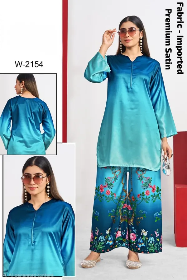This_satin_teal_kurta_paired_with_statement_floral_bottoms_is_all_about_grace_with_a_touch_of_bold._Perfect_blend_of_comfort_and_style