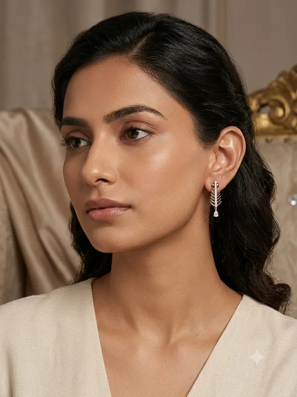 Natural_Diamond_Leaf_Drop_Earrings_in_Gold_–_0.71_Ct_Round_Brilliant_Diamond_Earrings