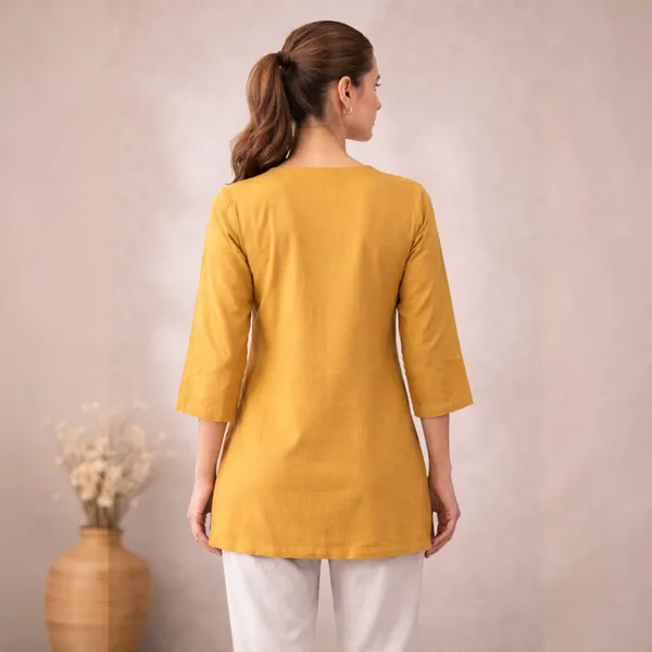 Yellow_Cotton_And_Polyester_Regular_Fit_Embroidered_Short_Kurti_For_Women