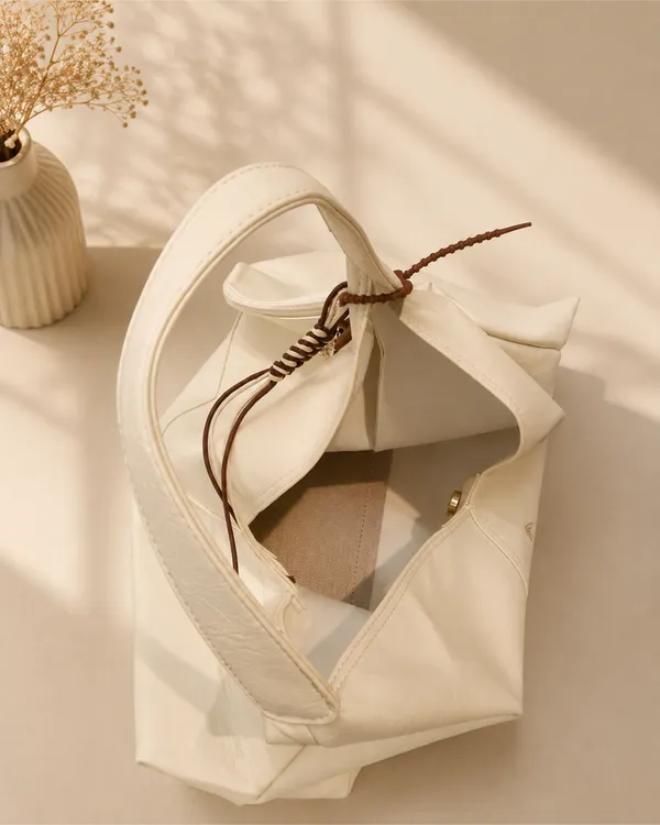 AKAVA_Splicing_Underarm_Bag_with_Pendant