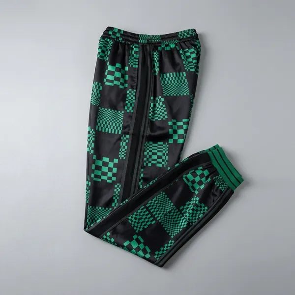 Black_And_Green_Satin_Relaxed_Fit_Checkered_Patchwork_Track_Pants_For_Men