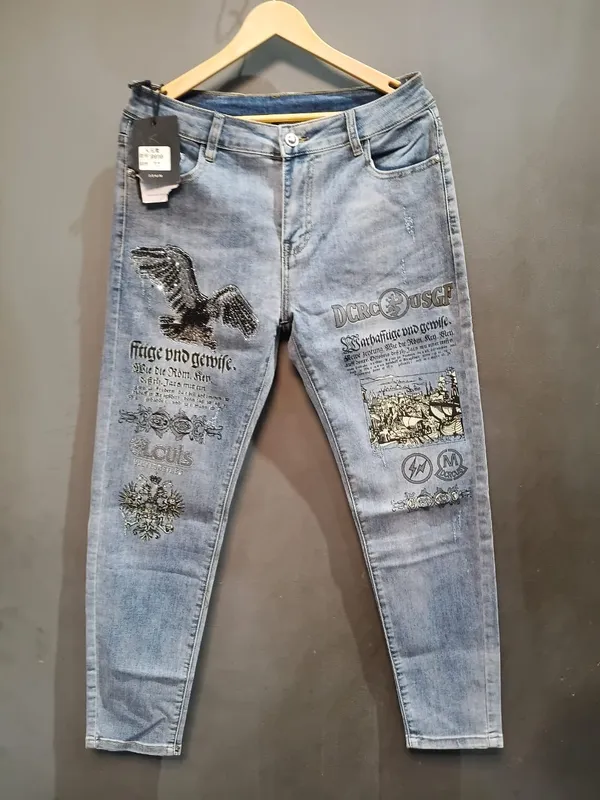Light_Blue_Denim_Slim_Fit_Embellished_Graphic_Jeans_For_Men