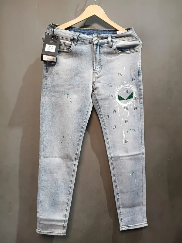 Light_Blue_Denim_Distressed_Slim_Fit_Jeans_For_Men