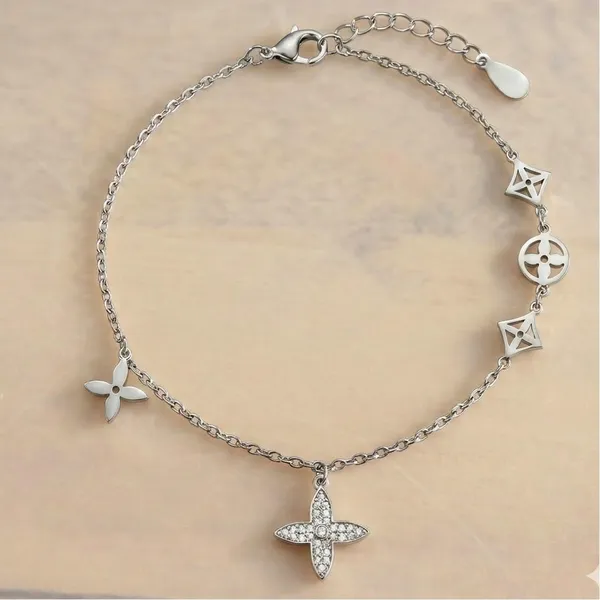 Silver_Sterling_Cubic_Zirconia_Poppy_Charm_Bracelet_For_Women