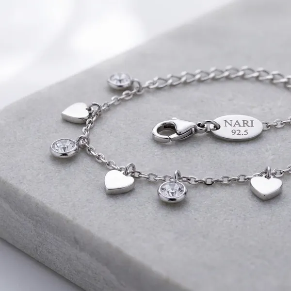 Silver_Sterling_Hearts_And_Charms_Chain_Bracelet_For_Women