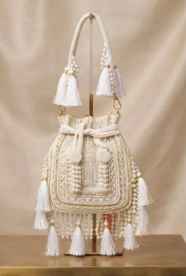 Handwork_Potli_with_Tessels_work