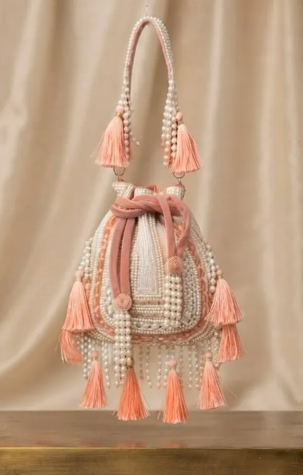 Handwork_Potli_with_Tessels_work
