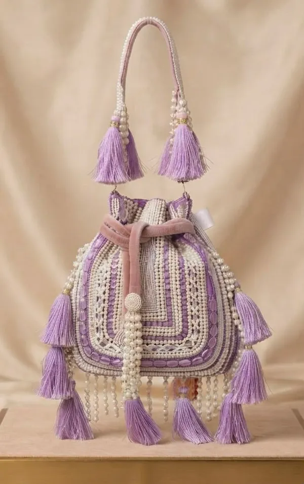 Handwork_Potli_with_Tessels_work