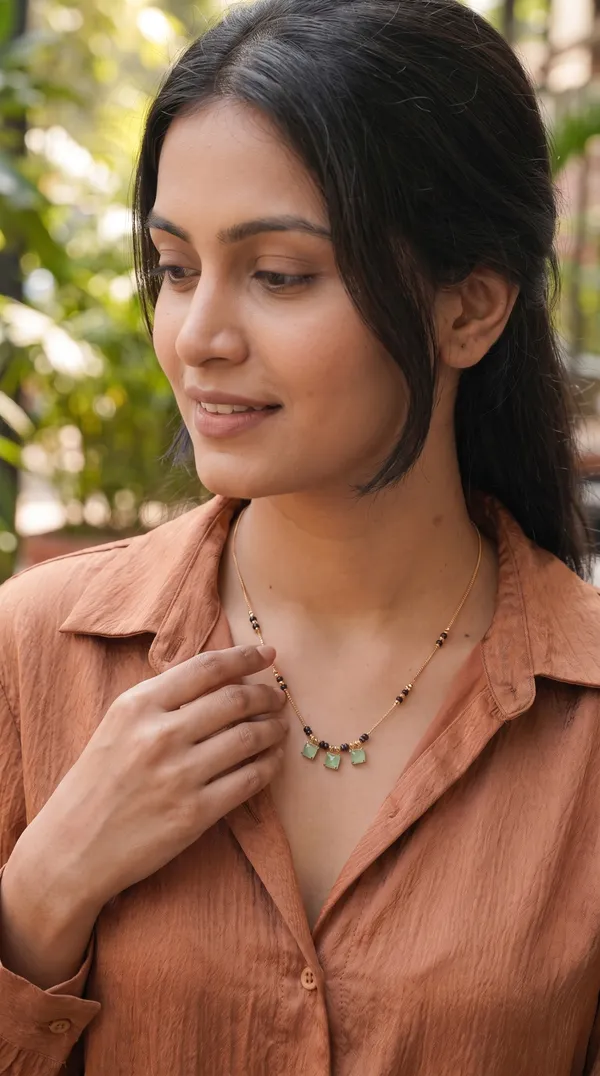Elegant_Gold-Plated_Mangalsutra_Necklace_with_Black_Beads_&_Mint_Green_Stone_Pendant