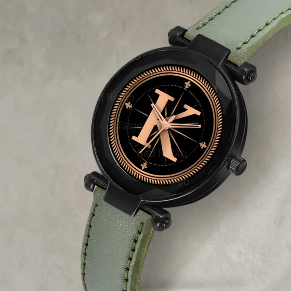 Sky_Mart_Alphabet_K_Stylish_New_Arrival_Analog_Watch_Trendy_Round_Black_Dial_And_Green_Leather_Strap_For_Women_And_Girls