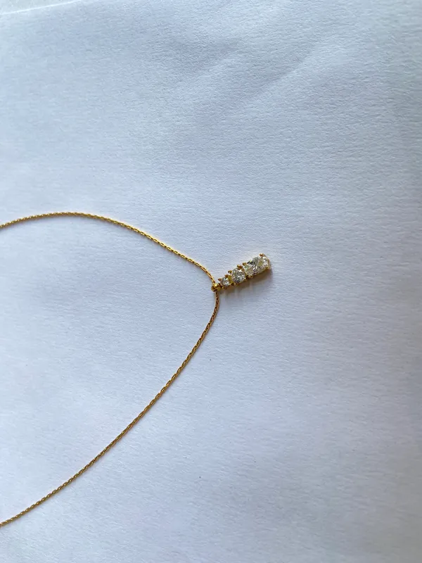 Gold_Stainless_Steel_Stone-Studded_Band_Pendant_For_Women