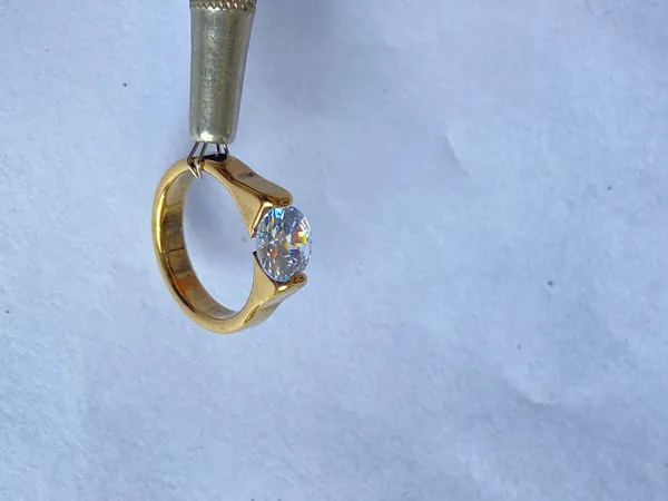 Gold-Tone_18Kt_Stainless_Steel_Stone_Studded_Buckle_Ring_For_Women