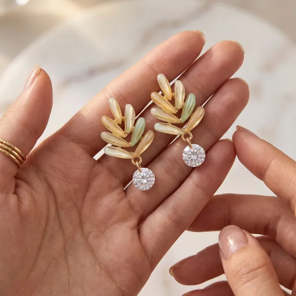 Gold_Leaf_Drop_Earrings_with_Crystal_Charm_for_Women_|_Elegant_Statement_Earrings