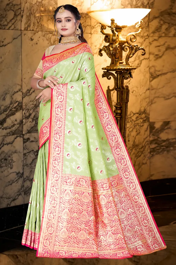 Women's_Banarasi_Art_Silk_Saree_–_pistel_green_&_Hot_Pink_Festive_Wear_Saree_with_Heavy_Woven_Zari_Border_and_Blouse_Piece