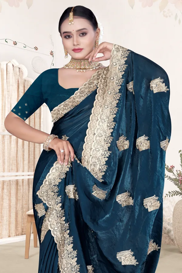 Women's_Emerald_PEACOCK_BLUE_Saree_–_Festive_Wear_Silk_Blend_Saree_with_Heavy_Silver_Zari_Embroidery_and_Blouse_Piece
