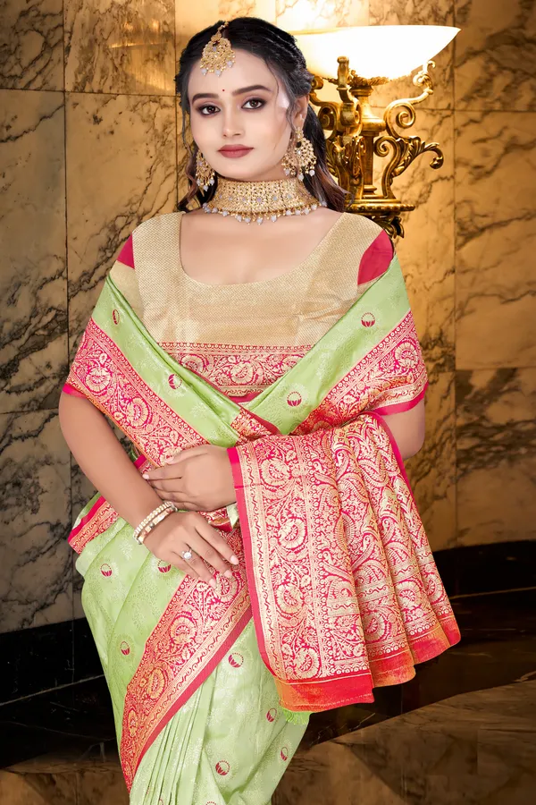Women's_Banarasi_Art_Silk_Saree_–_pistel_green_&_Hot_Pink_Festive_Wear_Saree_with_Heavy_Woven_Zari_Border_and_Blouse_Piece
