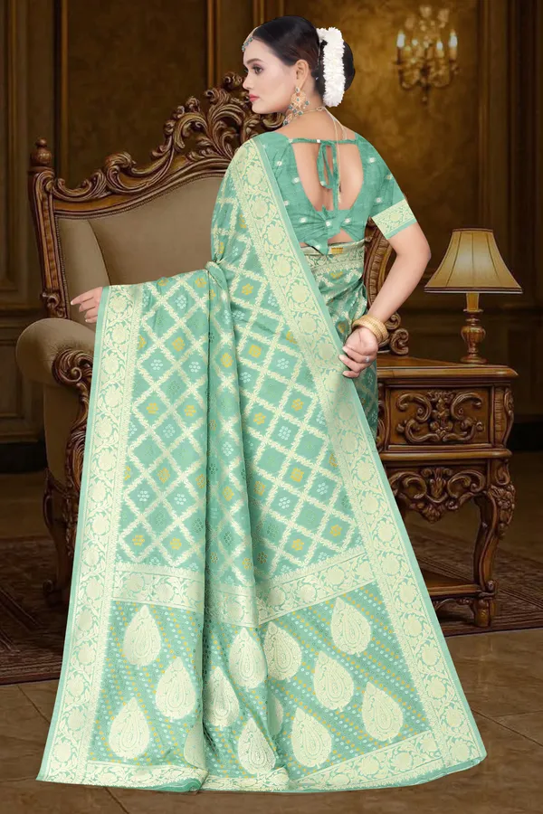 Women's_Banarasi_Art_Silk_Saree_–_Pastel_Mint_Green_Festive_Wear_Saree_with_Heavy_Woven_Golden_Zari_Border_and_Blouse_Piece
