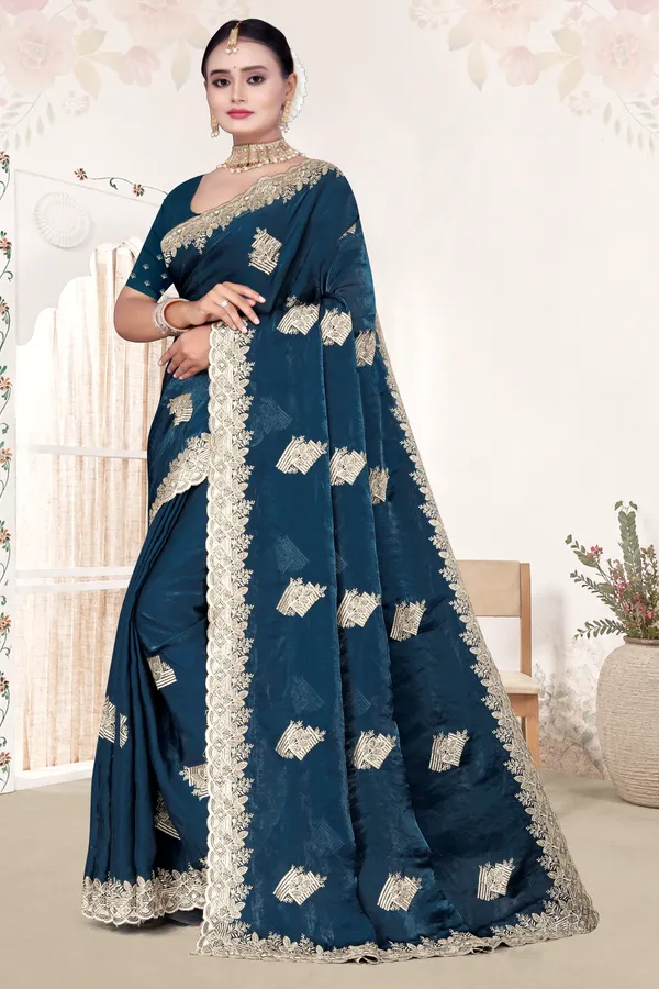 Women's_Emerald_PEACOCK_BLUE_Saree_–_Festive_Wear_Silk_Blend_Saree_with_Heavy_Silver_Zari_Embroidery_and_Blouse_Piece