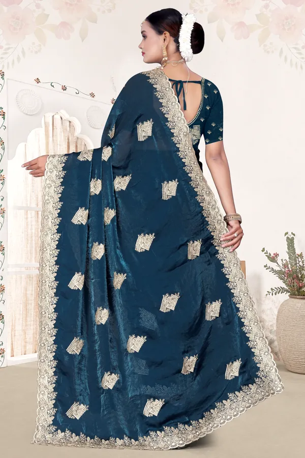 Women's_Emerald_PEACOCK_BLUE_Saree_–_Festive_Wear_Silk_Blend_Saree_with_Heavy_Silver_Zari_Embroidery_and_Blouse_Piece