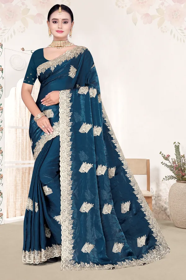 Women's_Emerald_PEACOCK_BLUE_Saree_–_Festive_Wear_Silk_Blend_Saree_with_Heavy_Silver_Zari_Embroidery_and_Blouse_Piece