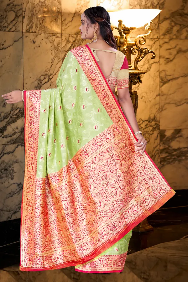 Women's_Banarasi_Art_Silk_Saree_–_pistel_green_&_Hot_Pink_Festive_Wear_Saree_with_Heavy_Woven_Zari_Border_and_Blouse_Piece