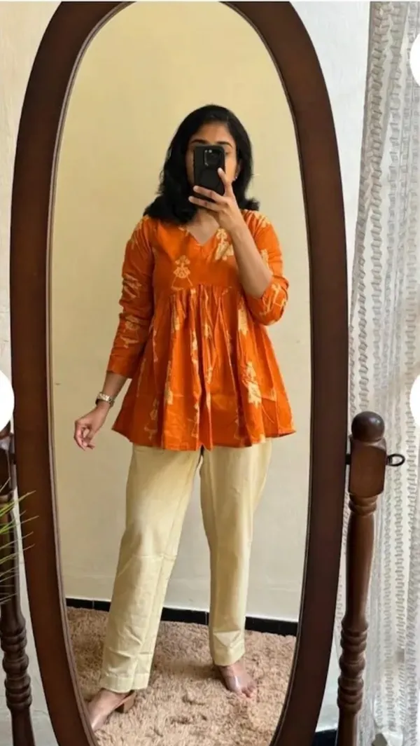 Women_Rust_Orange_Rayon_Printed_Peplum_Top_V-Neck_Flared_Kurti_Top_Casual_Ethnic_Wear