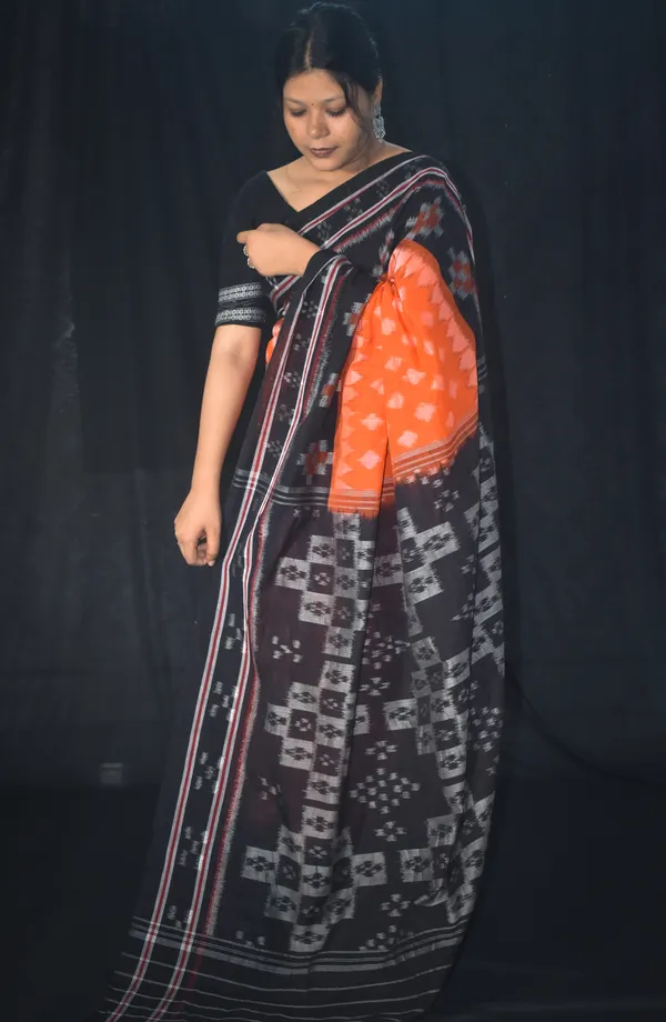 Bandhika_Maniabandha_Ikat_Pure_Cotton_Saree_–_Rust_Orange_&_Charcoal_Black_Traditional_Handloom_Design
