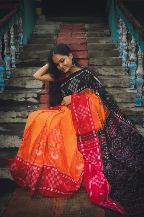 Bandhika_Maniabandha_Ikat_Pure_Cotton_Saree_–_Charcoal_Black,_Burnt_Orange_&_Maroon_Traditional_Handloom_Saree