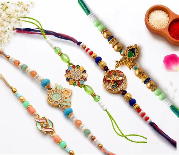 The_feather_collection_�_Premium,_hand_made,_rakhi_set_of_5,_roli_chawal_and_a_set_of_2_som