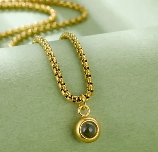 Gold_Tone_Chain_Necklace_With_Dark_Stone_Pendant_For_Women
