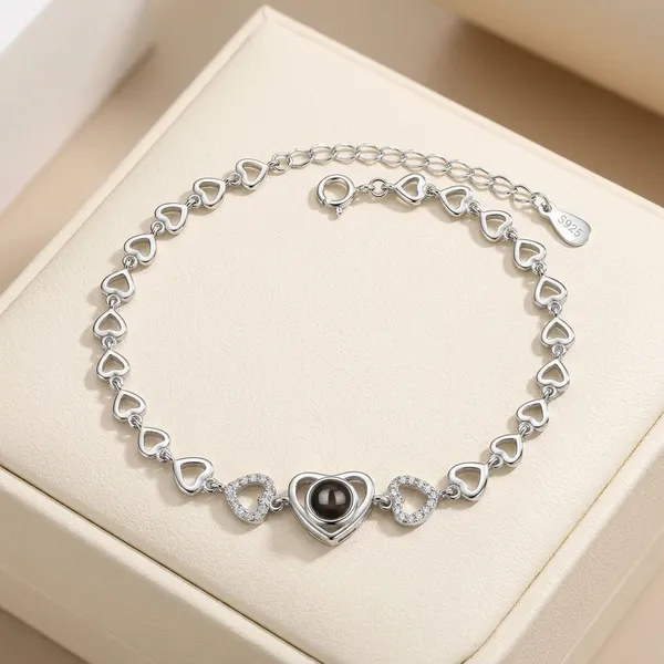 Silver_Heart_Chain_Bracelet_With_Black_Pearl_Centerpiece