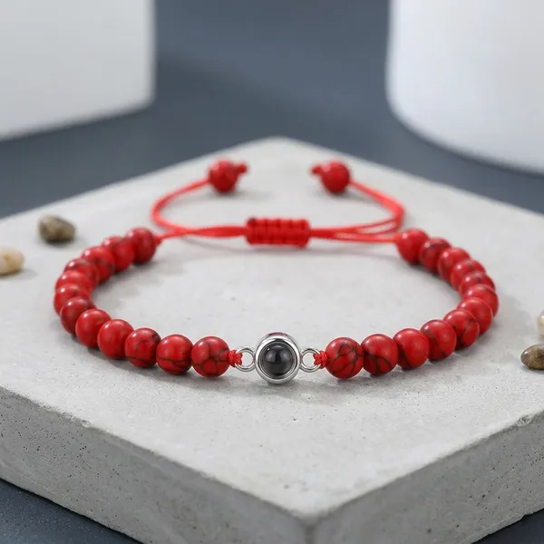 Red_Beaded_Adjustable_Bracelet_With_Silver_Charm