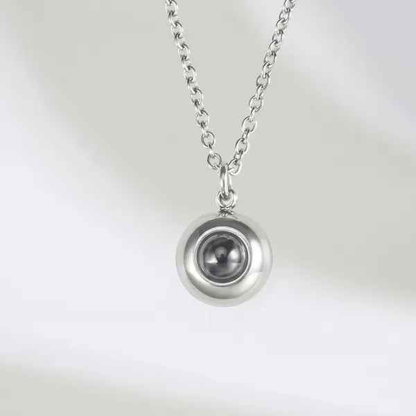 Silver_Round_Pendant_Necklace_With_Dark_Stone_For_Women