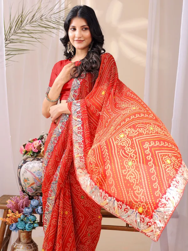Leelavati_Striped_Embroidered_Bandhani_Georgette_Saree_Orange