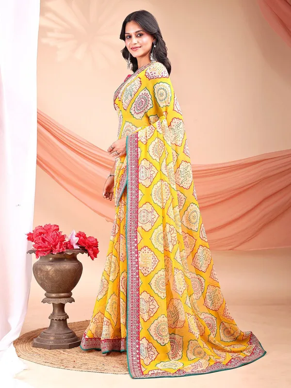 Leelavati_Striped_Embroidered_Bandhani_Georgette_Saree_Yellow_And_Pink