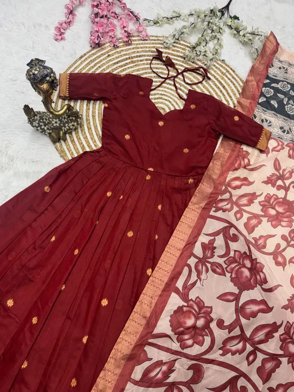 This_gown_made_from_jJacquard_weaving_zari_butti_fabric_And_soft_silk_Duppatta_with_zari_border